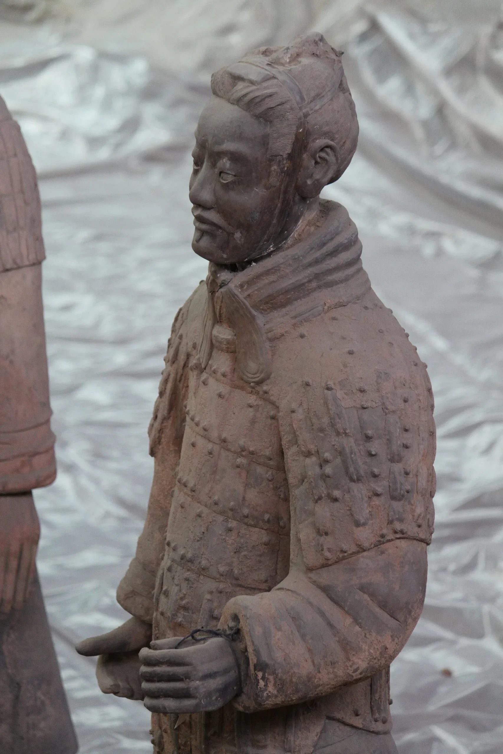Rosto e corpo de um guerreiro do Exército de Terracota